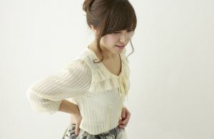 腰痛の女性